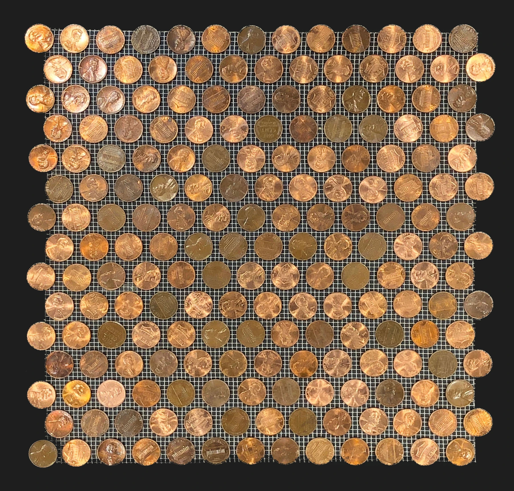 Real hand-arranged penny tile on mesh